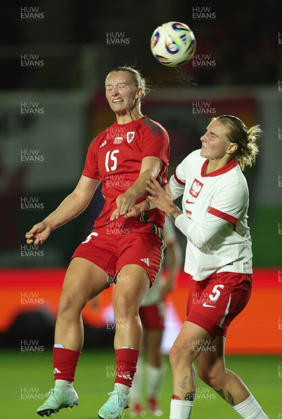 281025 - Wales v Poland, Women’s International Challenge Match - Elise Hughes of Wales wins the ball from Oliwia Wos of Poland