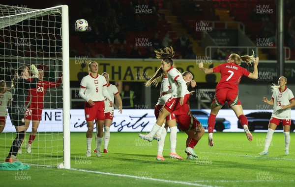 281025 - Wales v Poland, Women’s International Challenge Match - Ceri Holland of Wales sees her head at goal hit the bar