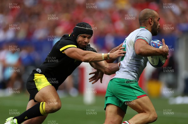 160923 - Wales v Portugal - Rugby World Cup France 2023 - Pool C - Leigh Halfpenny of Wales tackles Samuel Marques of Portugal 