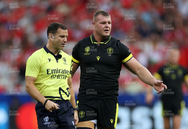 160923 - Wales v Portugal - Rugby World Cup France 2023 - Pool C - Dewi Lake of Wales with Referee Karl Dickson 