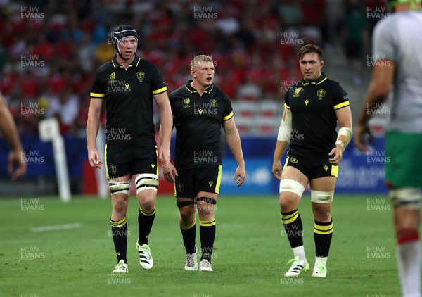 160923 - Wales v Portugal - Rugby World Cup France 2023 - Pool C - Adam Beard, Jac Morgan and Taine Basham of Wales 