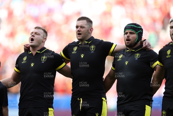 160923 - Wales v Portugal - Rugby World Cup France 2023 - Pool C - Dewi Lake, Dan Lydiate and Nicky Smith of Wales sing the anthem,
