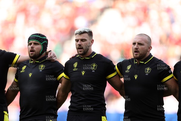 160923 - Wales v Portugal - Rugby World Cup France 2023 - Pool C - Nicky Smith, Johnny Williams and Dillon Lewis of Wales sing the anthem
