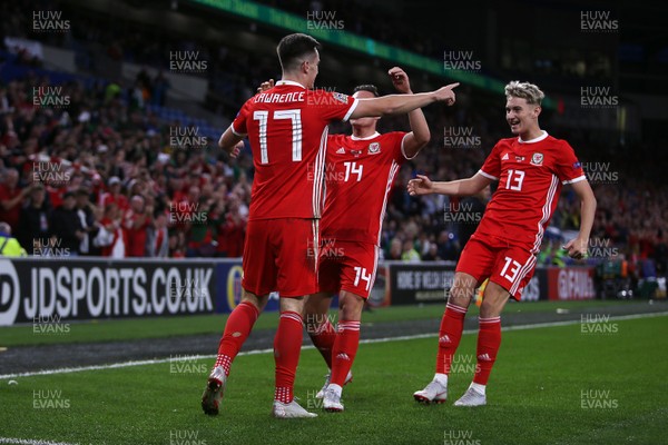 060918 - Wales v Republic of Ireland - UEFA Nations League - Tom Lawrence of Wales celebrates scoring the first  goal of the game with Connor Roberts and David Brooks