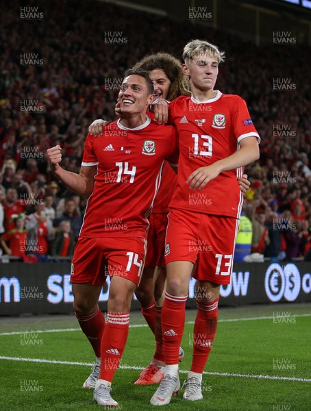 060918 - Wales v Republic of Ireland - UEFA Nations League - Connor Roberts of Wales celebrates scoring a goal with David Brooks and Ethan Ampadu
