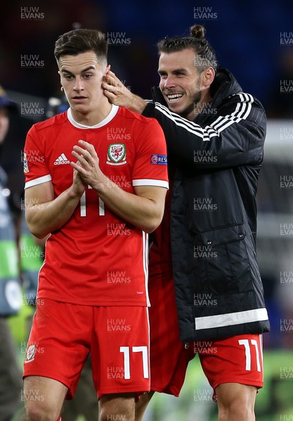 060918 - Wales v Republic of Ireland - UEFA Nations League - Tom Lawrence and Gareth Bale of Wales at full time