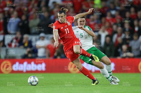 060918 - Wales v Republic of Ireland, UEFA Nations League - Gareth Bale of Wales gets past Ciaran Clarke of Republic of Ireland