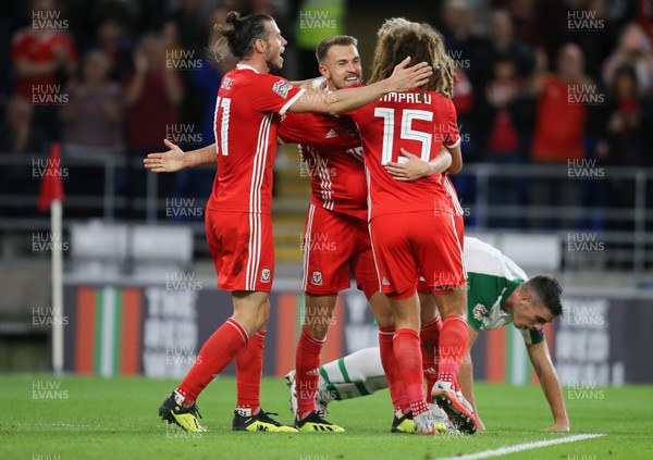 060918 - Wales v Republic of Ireland, UEFA Nations League - Aaron Ramsey of Wales celebrates with Gareth Bale of Wales  and Ethan Ampadu of Wales after he scores Wales' third goal
