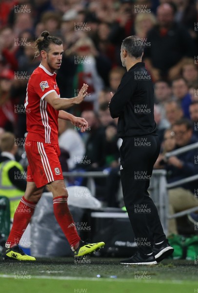 060918 - Wales v Republic of Ireland, UEFA Nations League - Wales Manager Ryan Giggs with Gareth Bale of Wales as he is substituted
