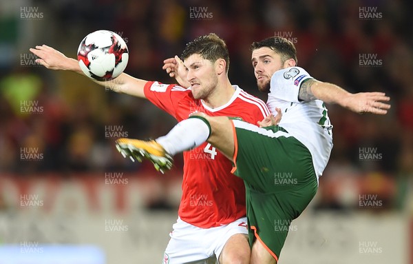 091017 - Wales v Republic of Ireland - FIFA World Cup Qualifier 2018 - Ben Davies of Wales and Robbie Brady of Republic of Ireland compete