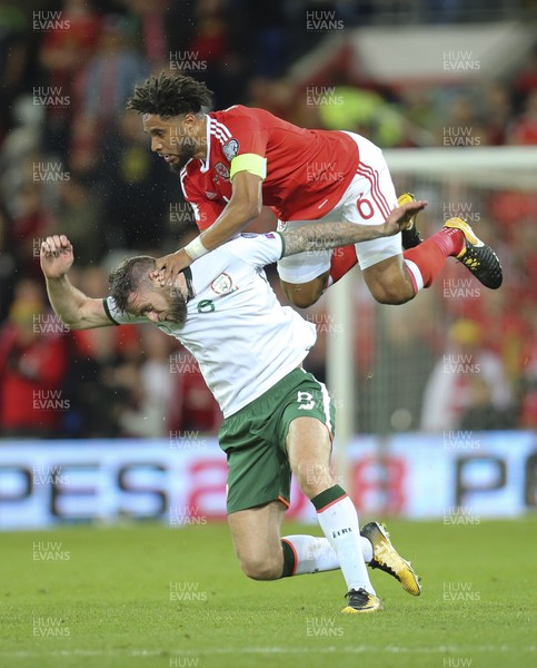 091017 - Wales v Republic of Ireland, FIFA World Cup 2018 Qualifier - Ashley Williams of Wales challenges Daryl Murphy of Republic of Ireland for the ball