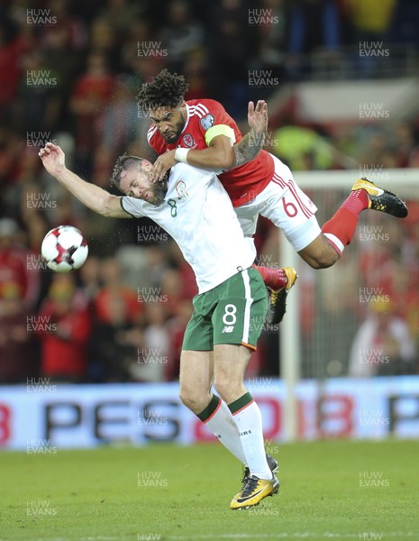 091017 - Wales v Republic of Ireland, FIFA World Cup 2018 Qualifier - Ashley Williams of Wales challenges Daryl Murphy of Republic of Ireland for the ball