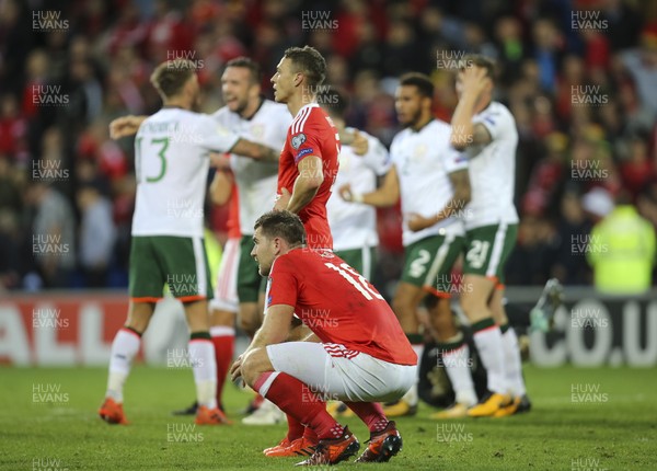 091017 - Wales v Republic of Ireland, FIFA World Cup 2018 Qualifier - Sam Vokes of Wales and James Chester of Wales look on as the Republic of Ireland celebrate on the final whistle