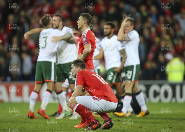 091017 - Wales v Republic of Ireland, FIFA World Cup 2018 Qualifier - Sam Vokes of Wales and James Chester of Wales look on as the Republic of Ireland celebrate on the final whistle