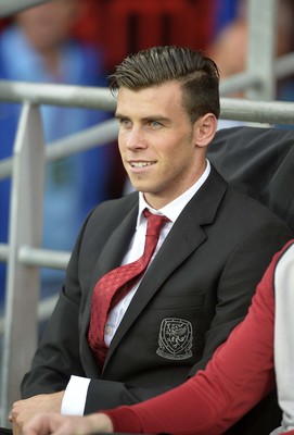 140813 - Wales v Republic of Ireland, International Friendly -   Gareth Bale of Wales takes his place on the bench before the match
