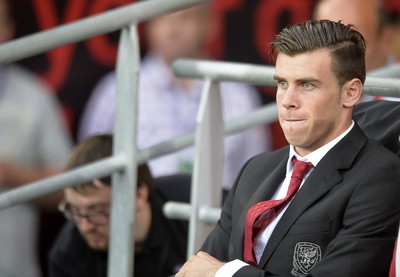 140813 - Wales v Republic of Ireland, International Friendly -   Gareth Bale of Wales takes his place on the bench before the match