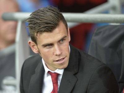 140813 - Wales v Republic of Ireland, International Friendly -   Gareth Bale of Wales takes his place on the bench before the match