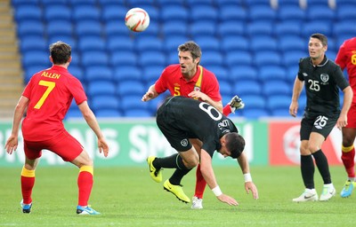 140813 - Wales v Republic of Ireland, Vauxhall International Friendly - Wales' Sam Ricketts puts Republic of Ireland's Shane Long under pressure