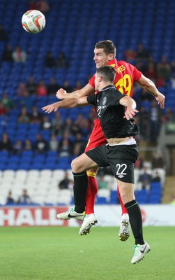 140813 - Wales v Republic of Ireland, Vauxhall International Friendly - Wales' Sam Vokes heads at goal