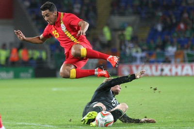 140813 - Wales v Republic of Ireland, Vauxhall International Friendly - Wales' Neil Taylor is tackled by Republic of Ireland's Paul Green