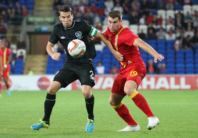 140813 - Wales v Republic of Ireland, Vauxhall International Friendly - Republic of Ireland's Seamus Coleman and Wales' Sam Vokes compete for the ball