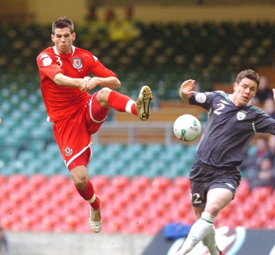 17.10.07 - Euro 2008 Qualifying Match, Group D Wales v Republic of Ireland Wales' Joe Ledley and Ireland's Steve Finnan compete 