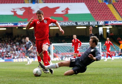 17.10.07 - Euro 2008 Qualifying Match, Group D Wales v Republic of Ireland Wales' Chris Gunther is tackled by Ireland's Aiden McGeady 