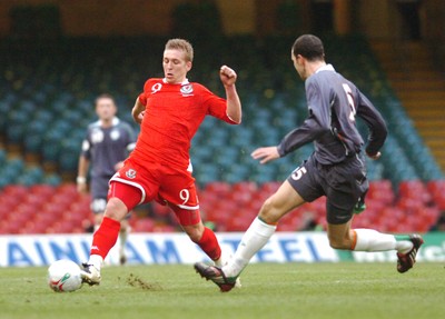17.10.07 - Euro 2008 Qualifying Match, Group D Wales v Republic of Ireland Wales' Freddy Eastwood tries to get past Ireland's John O'Shea 