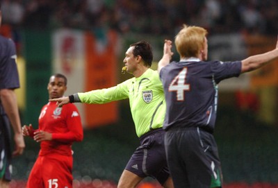17.10.07 - Euro 2008 Qualifying Match, Group D Wales v Republic of Ireland Ireland's Paul McShane (4) appeals as referee Olech Oriekhow points to the penalty spot 