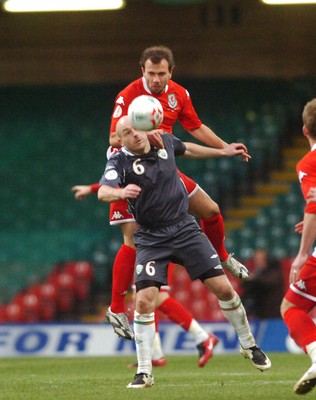 17.10.07 - Euro 2008 Qualifying Match, Group D Wales v Republic of Ireland Wales' Carl Fletcher and Ireland's Lee Carsley compete for a high ball 