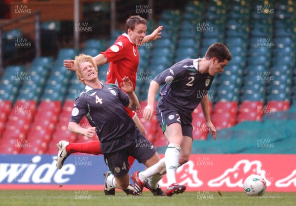 17.10.07 - Euro 2008 Qualifying Match, Group D Wales v Republic of Ireland Ireland's Paul McShane goes down as Wales' Chris Gunther challenges Steve Finnan 