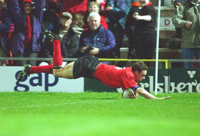 1-11-02 Wales v Romania  (Wrexham, The Racecourse)Wales' Mark Jones dives over to score the second try