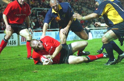 1-11-02 Wales v Romania  (Wrexham, The Racecourse)Wales' Gareth Thomas crashes over to score the third try