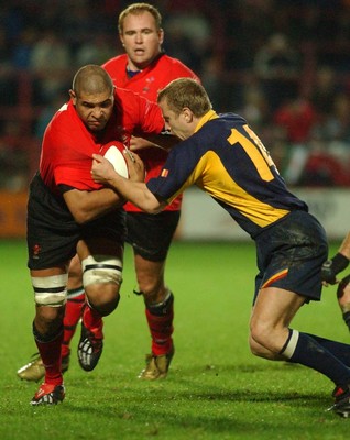 011102  Wales v RomaniaWales Colin Charvis is stopped by Vasile Ghioc