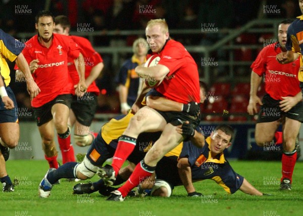 011102  Wales v RomaniaWales Tom Shanklin is tackled short of the line