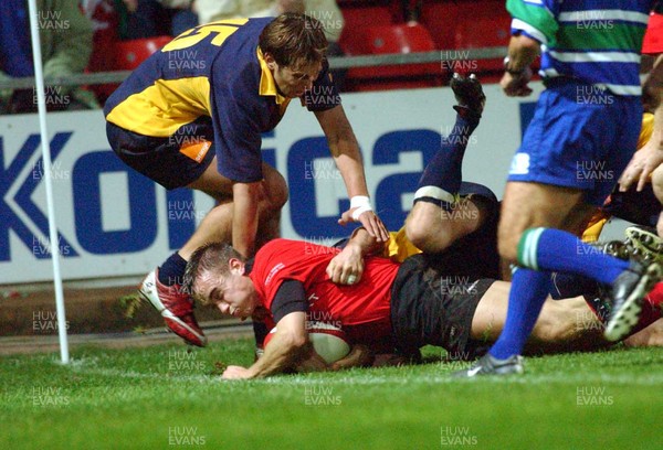 1-11-02 Wales v Romania  (Wrexham, The Racecourse)Wales' Rhys Williams gets close to try-line but is held by Dan Dumbrava (left)