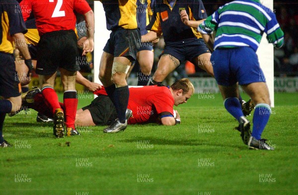 1-11-02 Wales v Romania  (Wrexham, The Racecourse)Wales' Scott Quinnell grounds the ball to score