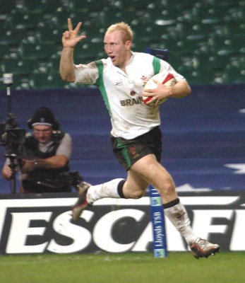 12-11-04. Wales v Romania.  Wales' Tom Shanklin shows delight as he scores his third try.  