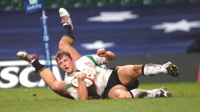 12-11-04. Wales v Romania.  Wales' Dafydd Jones dives over to score try.  