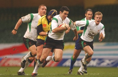 12.11.04 Wales v Romania  Wales Stephen Jones finds a gap.  