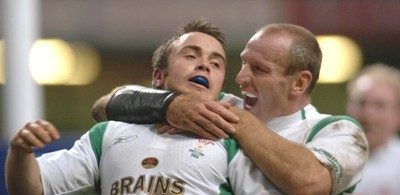 12-11-04. Wales v Romania.  Wales' Rhys Williams (Try Scorer) celebrates with Captain Gareth Thomas.  