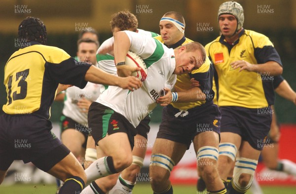 12.11.04 Wales v Romania   Wales Gethin Jenkins is tackled by Florin Tatu   