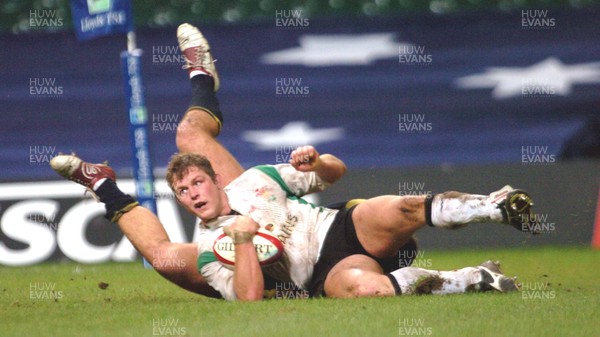 12-11-04. Wales v Romania.  Wales' Dafydd Jones dives over to score try.  