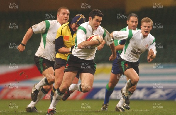 12.11.04 Wales v Romania  Wales Stephen Jones finds a gap.  