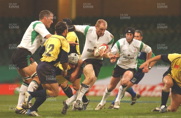 12.11.04 Wales v Romania  Wales skipper Gareth Thomas beats tackle by CristianPetre  