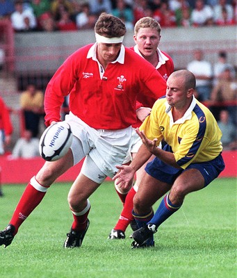 300897 - Wales v Romania - Steve Williams punches on the loose ball