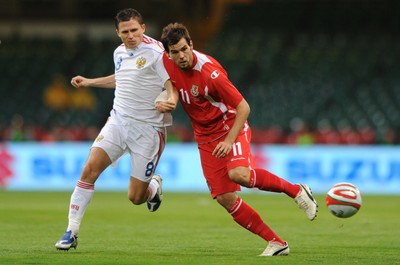 09.09.09 -  Wales v Russia - World Cup 2010 Qualifier Group Four - Joe Ledley of Wales is challenged by Igor Semshov of Russia. 