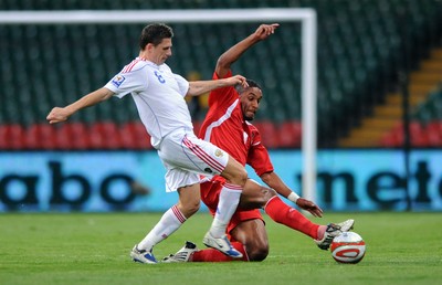 09.09.09 -  Wales v Russia - World Cup 2010 Qualifier Group Four - Ashley Williams of Wales is tackled by Igor Semshov of Russia. 