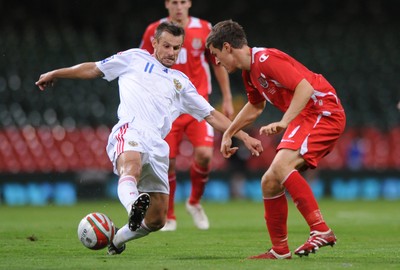09.09.09 -  Wales v Russia - World Cup 2010 Qualifier Group Four - Aaron Ramsey of Wales is tackled by Serget Semak of Russia. 