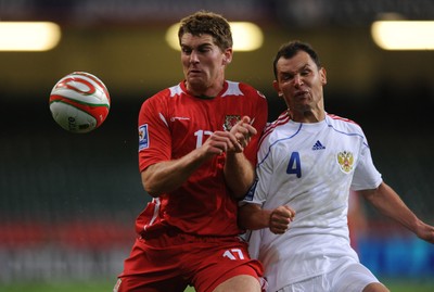 09.09.09 -  Wales v Russia - World Cup 2010 Qualifier Group Four - Sam Vokes of Wales and Sergei Ignashevich of Russia compete. 